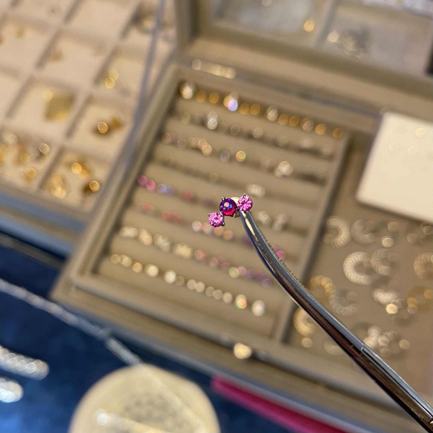 Piercing tris rosa