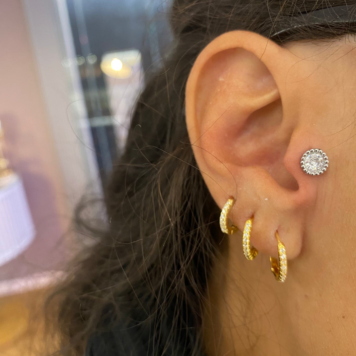 Piercing punto luce rock