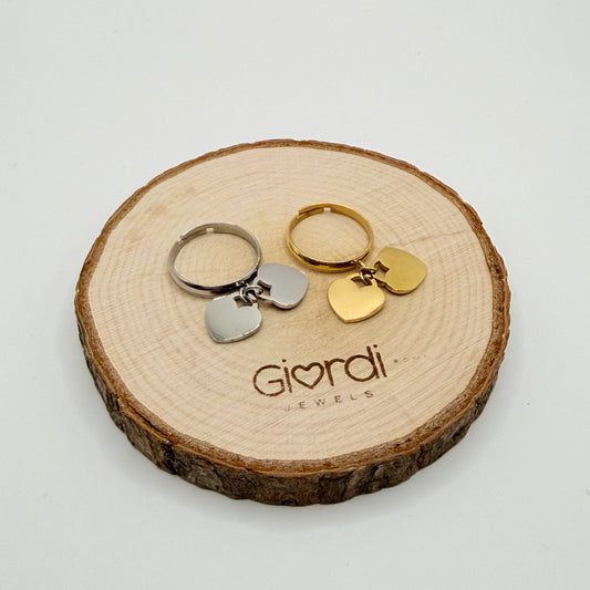 Anello cuore pendente