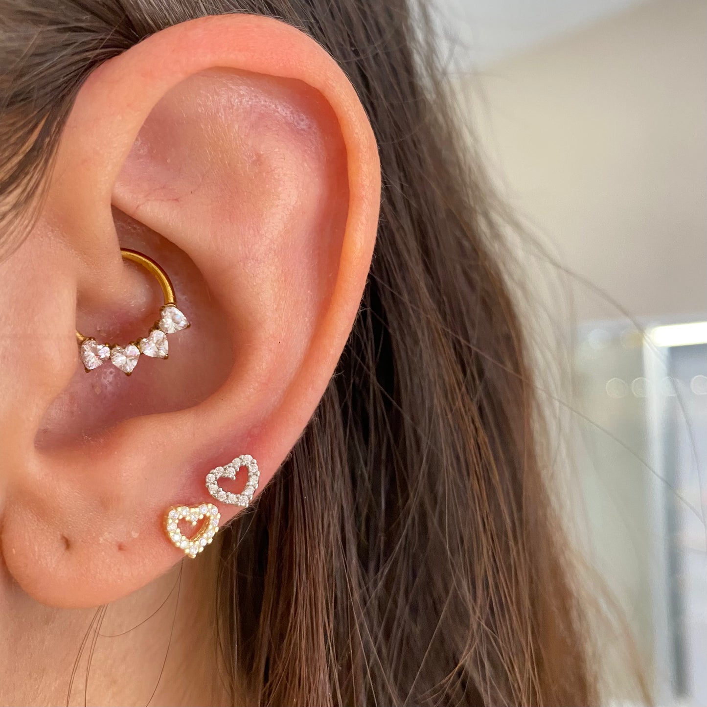 Piercing mono cuoricino forato
